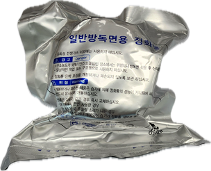 나사선 정화통 포장면 (은색 포장지에 감싸져 있고 나사선이 돌출되어있음)